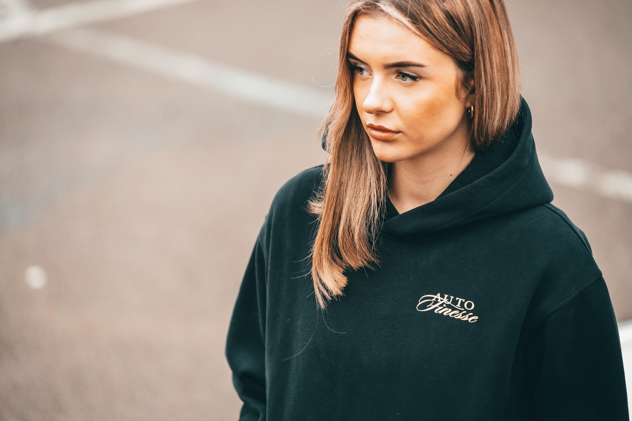 Lady Wearing Auto Finesse Hoodie