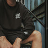 Oversized Signature Logo Crew Neck Sweater_ Man Wearing_ Front